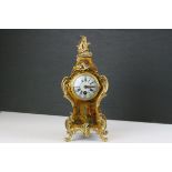19th century Rococo Style Mantle Clock, the wooden lacquered case decorated with classical figures