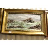 Pair of Framed Oil Paintings of stormy seascapes, 26cms x 50cms, gilt framed