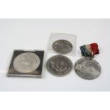 A 1908 commemorative medal together with a selection of commemorative coins.