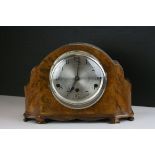A walnut Art Deco walnut mantle clock with three train movement.
