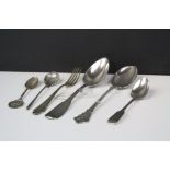 A small collection of cutlery to include a silver Russian spoon.