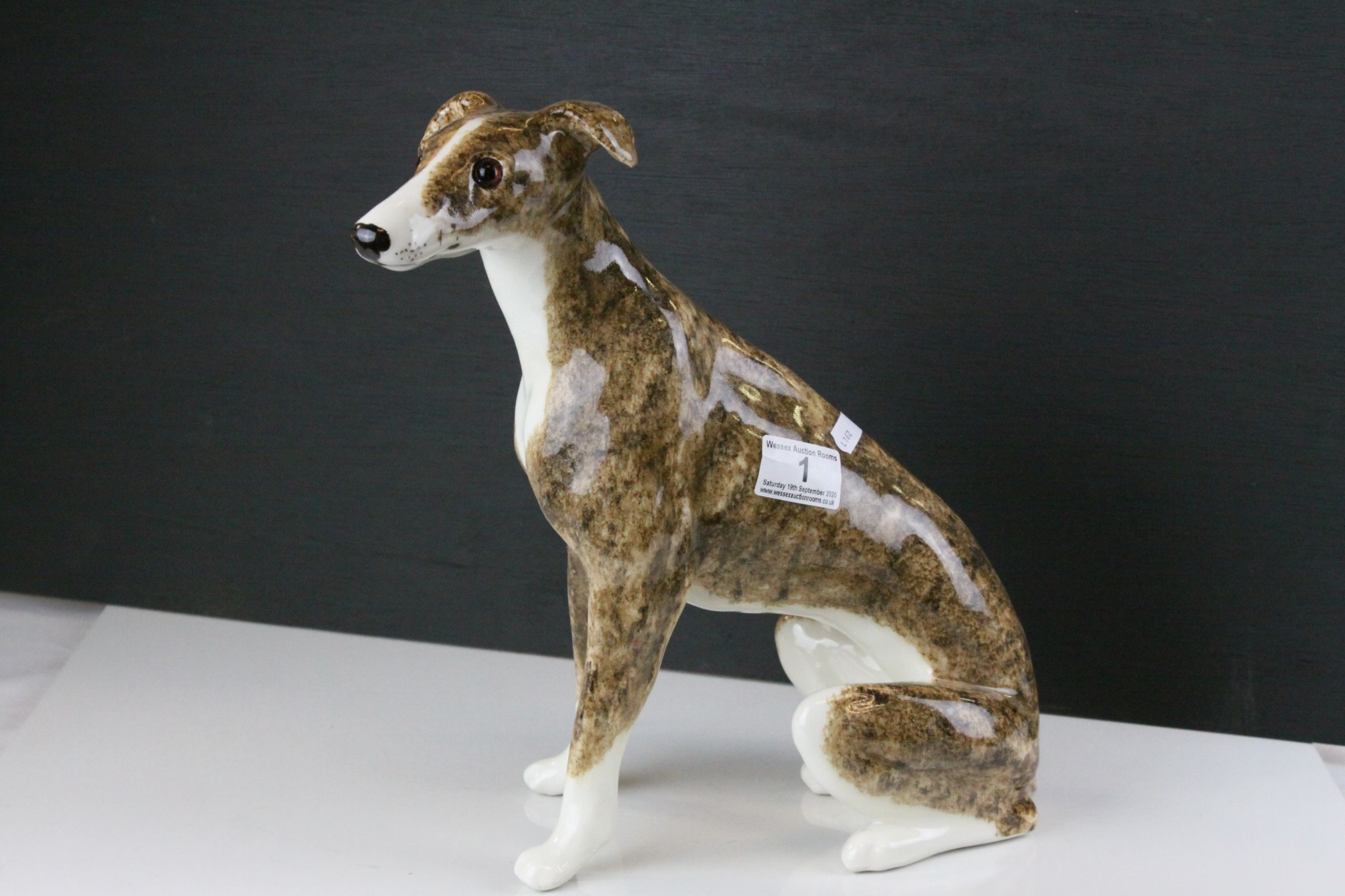 Large Winstanley Seated Greyhound / Dog, numbered 8, 33cms high