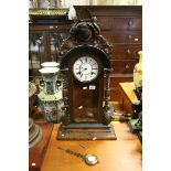 19th century Walnut Cased Regulator Mantle Clock, Carved Dog Mask to Pediment, the white enamel face