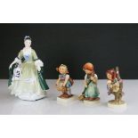 A Royal Doulton figure Elegance and three Goebel figures of children.