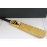 A Duncan Fearnley cricket bat signed by the Leicestershire cricket team to include David Gower,
