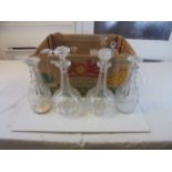 A quantity of glass decanters to include three ring 19th century, together with a group of glasses.