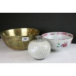 A Chinese footed bowl with floral decoration a similar brass bowl signed with character marks and