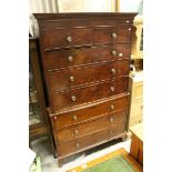 Early 19th century Mahogany Chest on Chest with an arrangement of eight drawers, raised on swept