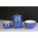 Three 20th century Moorcroft blue ground items to include two bowls and a lidded jug.