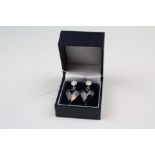 Pair of Silver and CZ Heart shaped Drop Earrings
