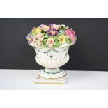 Chelsea Porcelain Flower Encrusted Urn with Gold Anchor mark to base, 15cms high