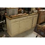 Large painted dresser base of four drawers & four doors, 177cms long