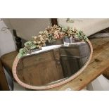 1920's / 30's Pink and Cream Painted Oval Bevelled Edge Mirror with applied flower to top of