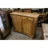 19th century Continental Pine Cabinet comprising Two Drawers over Two Cupboard Doors 122cms long x