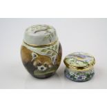 Two Elliot Hall enamel collectables to include a lidded jar decorated with a Red Panda and