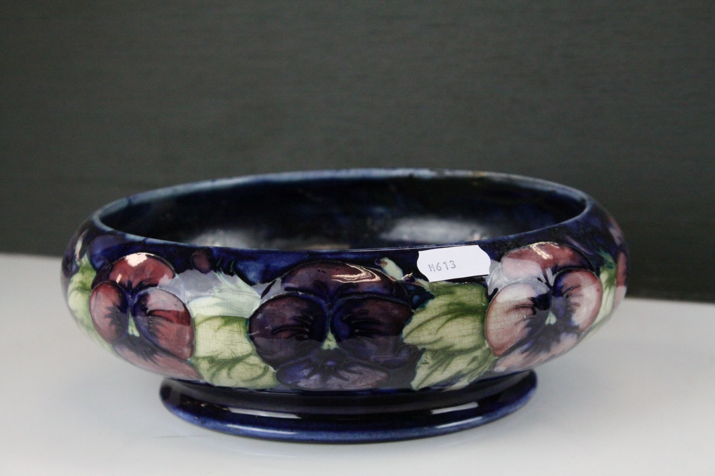 William Moorcroft Pansies Shallow Bowl, 22cms diameter (a/f)