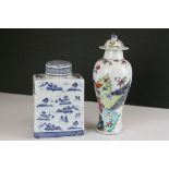 An antique Chinese tobacco pattern lidded vase together with a blue and white caddie .