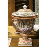 Large 19th century Capodimonte two handled Urn with Lid decorated with classical motifs and naked