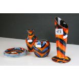 Three Anita Harris tiger stripe pattern vases together with two pin dishes .