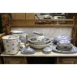 A quantity of blue and white willow pattern china to include jug and bowl and slop bucket, tureen,