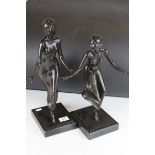 Pair of Russian patinated Bronze Figures of Stylised Dancing Girls, both signed indistinctly to