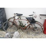 Vintage Triumph Traffic Master Bicycle plus a Raleigh Bicycle
