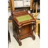 Victorian Style Mahogany Davenport, the sloping green leather inset top opening to reveal eight