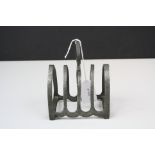 An arts and crafts style Craftsman Pewter toast rack.