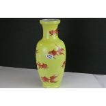 A yellow ground Chinese vase decorated with fish, character marks to underside, converted to lamp