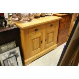 Modern Oak Dresser Base / Cabinet comprising Two Drawers with cup handles over two cupboard doors,