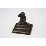 Antique Bronze of a Monkey seated on a plinth