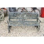 Victorian Cast Iron Garden Bench, the foliate cast ends with dog heads to arm ends and terminating