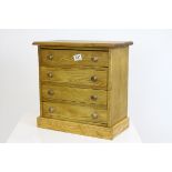 Ash wood table top chest of four drawers