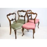 Set of Six Victorian Rosewood Dining Chairs with scroll carved back rails and splats, stuff over