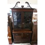 Early 19th century Mahogany Inlaid Bookcase, the upper section with break swan neck pediment and