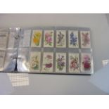 Cigarette Cards - album of complete sets of cards relating to flowers including Wills Garden Flowers