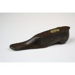 An early 19th century snuff shoe with pique decoration.