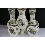 Royal Doulton - Two Pairs of Vases and a further vase, all decorated in the same floral pattern on