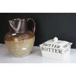 An Emma Bridgewater butter dish together with a large stoneware harvest jug.