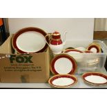 An Aynesley dinner service with gilt and red banded decoration.