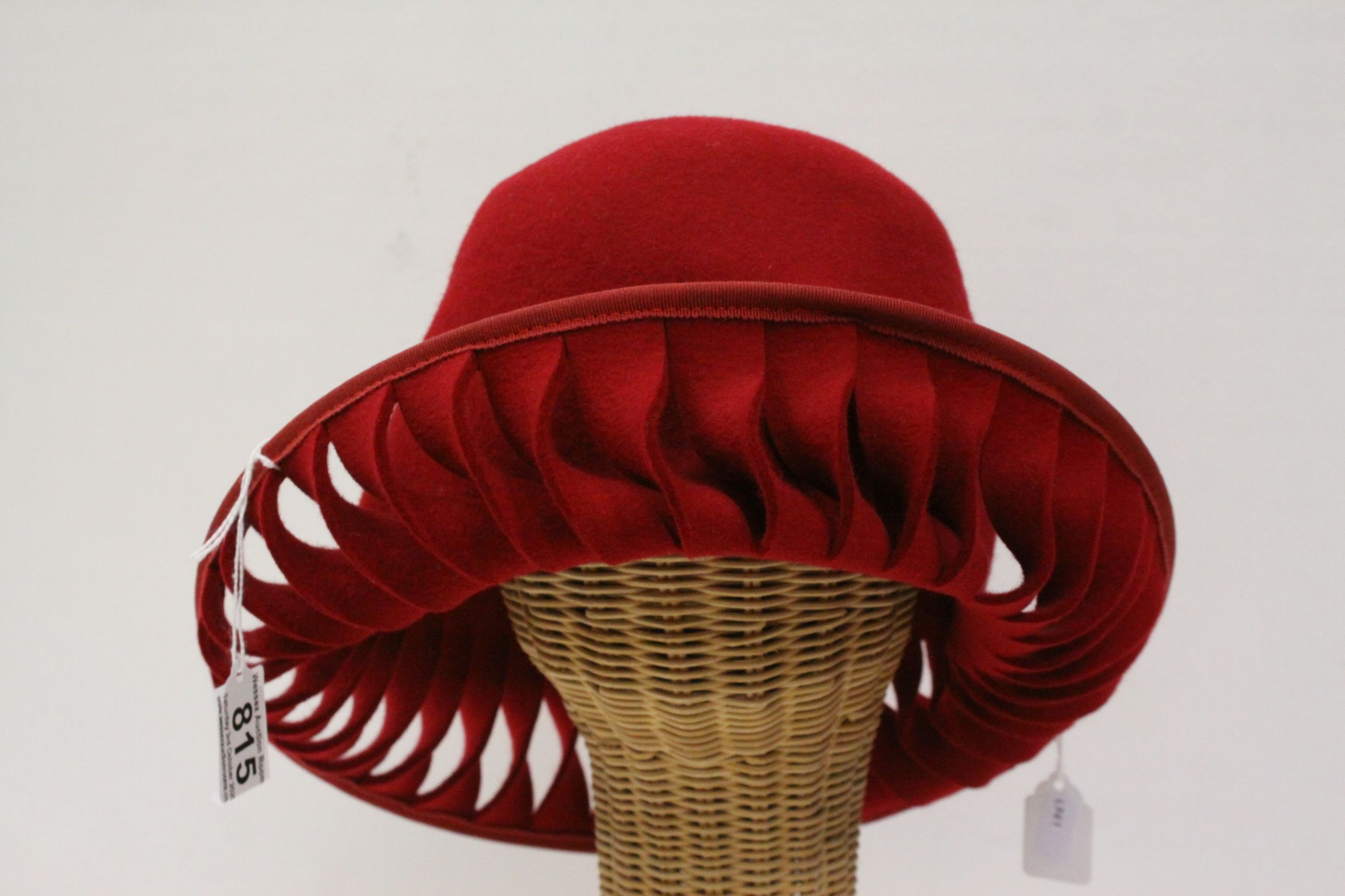 Elvis Pampilio Bruxelles, asymetric red felt hat with pierced twist design border together with - Image 2 of 2