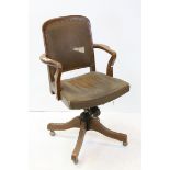 Early 20th century Oak Framed Office Swivel Elbow Chair