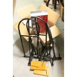 Box of Candles, Three Metal Saddle Racks and a Glass Book Trough with Wooden Ends