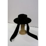 Elvis Pampilio, black velvet hat with diamantes and matching felt ties, together with hat stand.