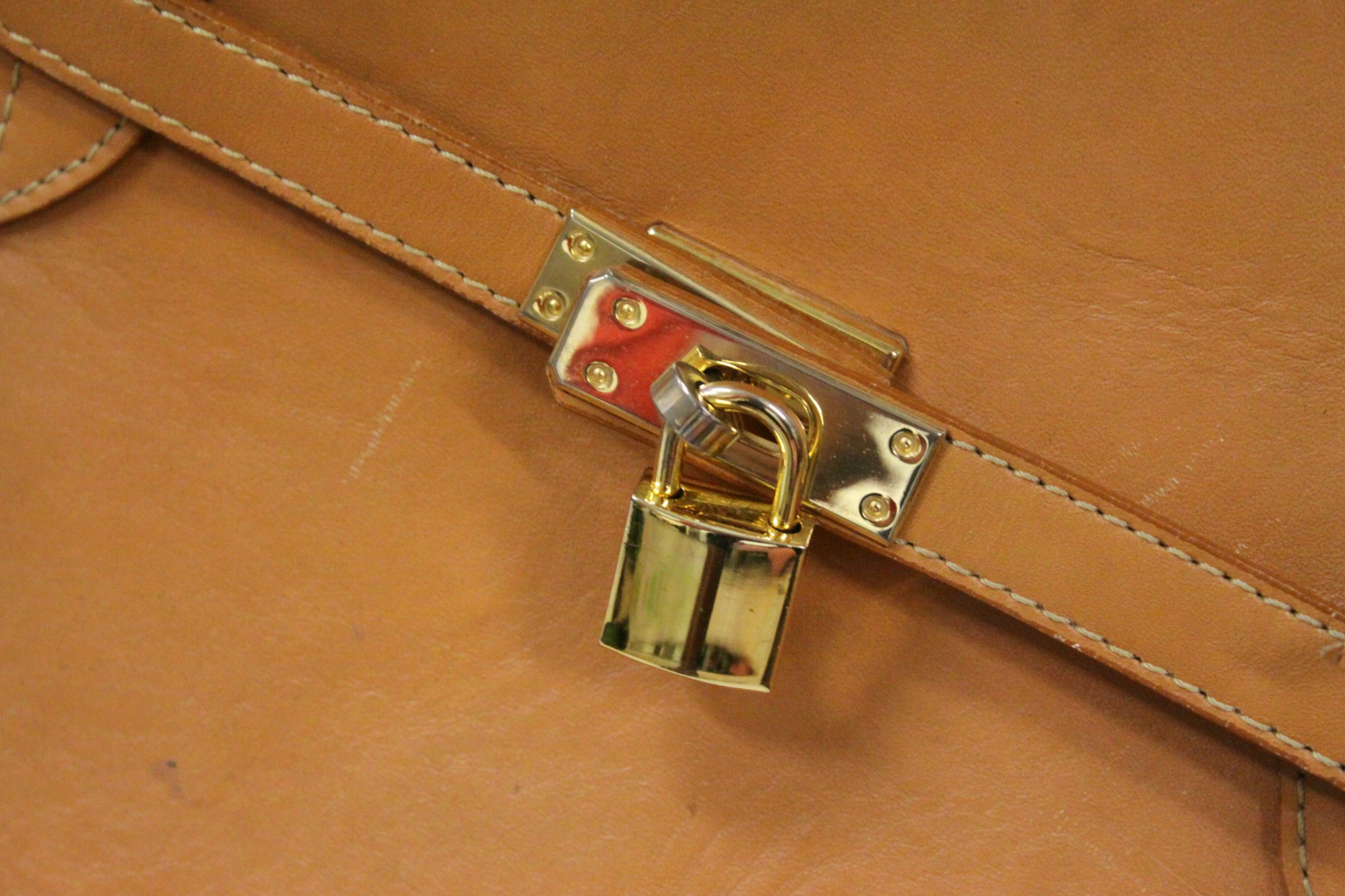 Large birkin style tan leather travel bag, leather interior, padlock clasp with key, width approx - Image 2 of 3