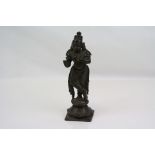 A bronze indian deity figure, stands approx 16.5cm tall.