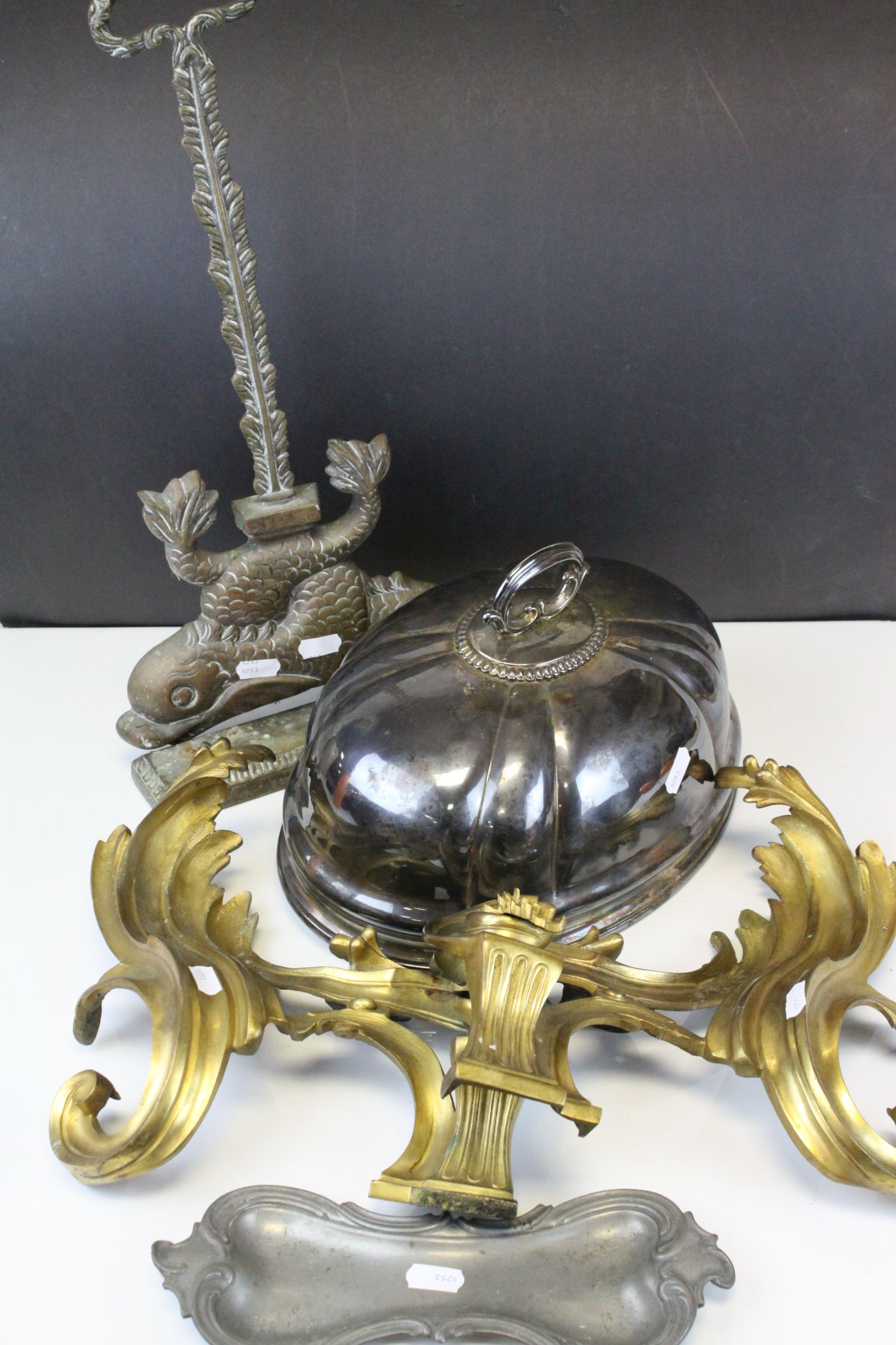 Pair of Gilt Brass Scrolling Brackets, 29cms high together with Brass ' Dolphin ' Doorstop, Silver