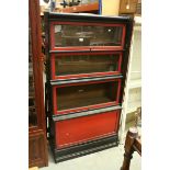 Four Section Globe-Wernicke Stacking Bookcase, with an ebonised and red finish, the top two sections