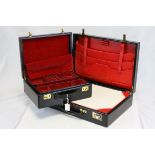 Good quality black leather brass mounted attaché correspondence case together with a similar