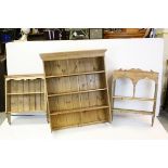 Two Pine Hanging Shelves, largest 64cms x 76cms, together with a Pine Dresser Top